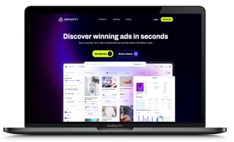 AdPlexity website displayed on a Macbook
