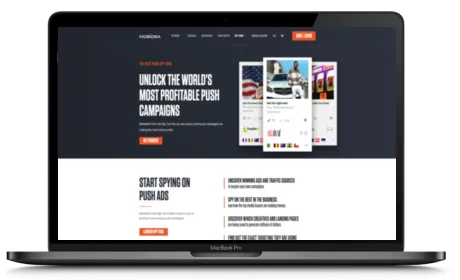 Mobidea Spy website displayed on a Macbook