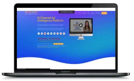 PowerAdSpy website displayed on a Macbook