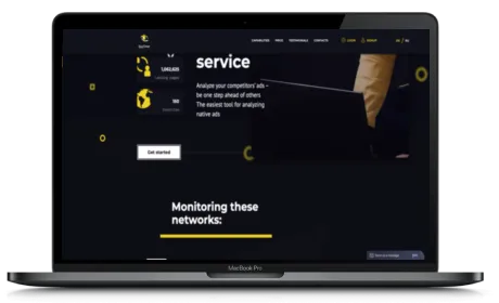 SpyOver website displayed on a Macbook