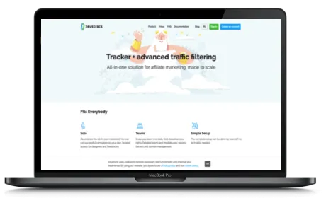 Zeustrak website displayed on a Macbook